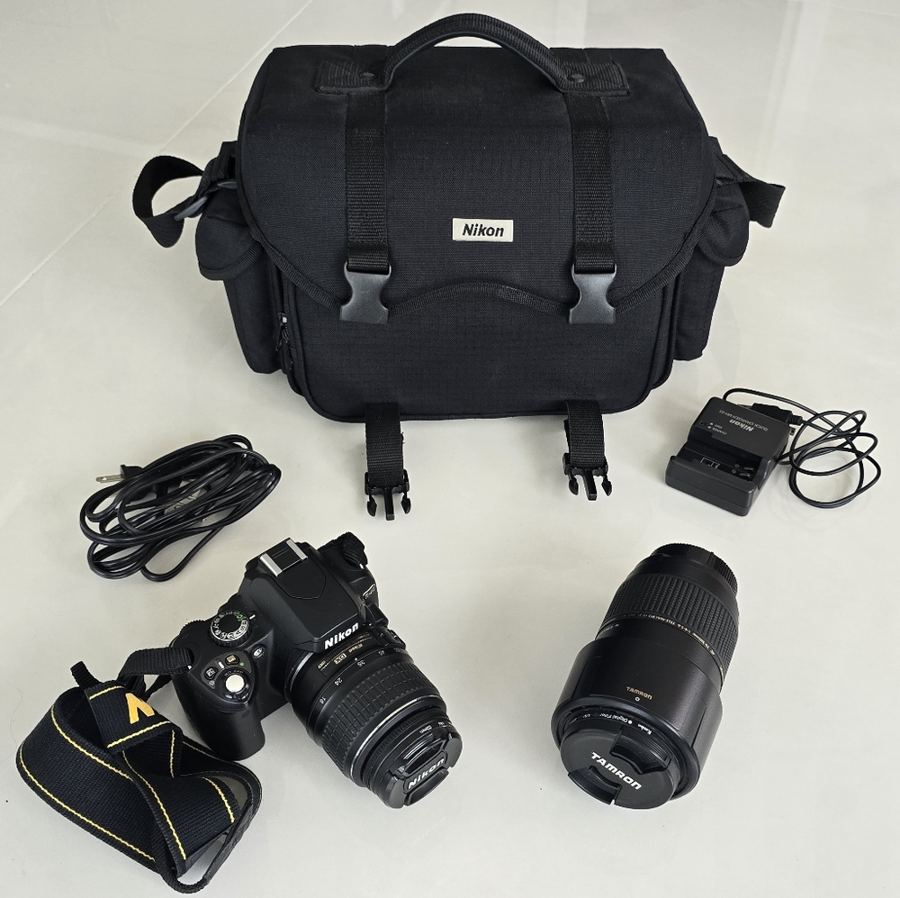 Nikon D40 Black Digital Camera with Two Lenses, Camera Bag And Charging Cord